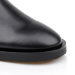 Black leather Chelsea boot with strap - Close-up View