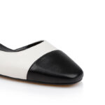 Cream_Black Hollow Pump - Close-up View